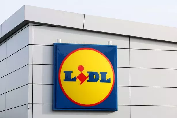 A Lidl logo is displayed outside one of its stores on October 17, 2023 in Middlewich, United Kingdom