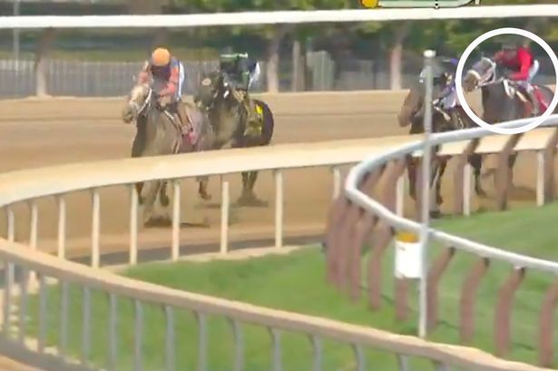 Aye Eye (circled) was this far behind as the leaders galloped into the home straight