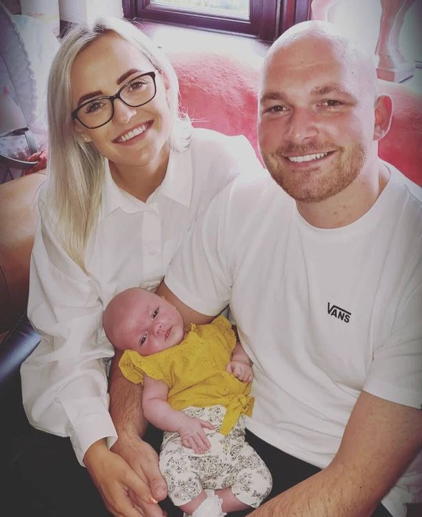 The couple with their daughter Sloane