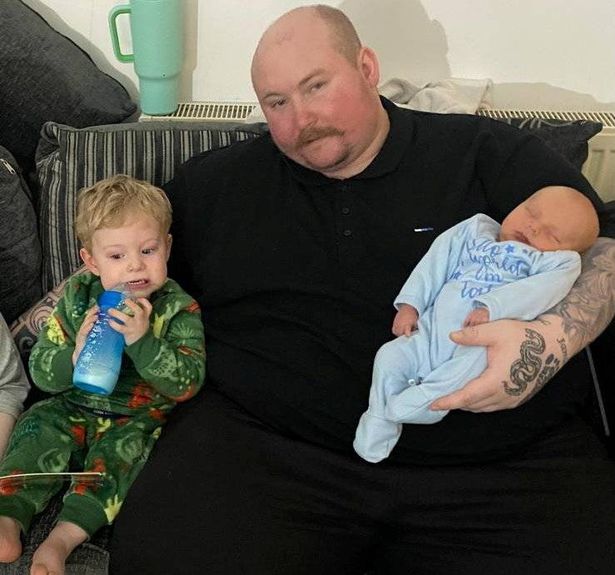 Dale Forrest before his weight loss with son Bailey