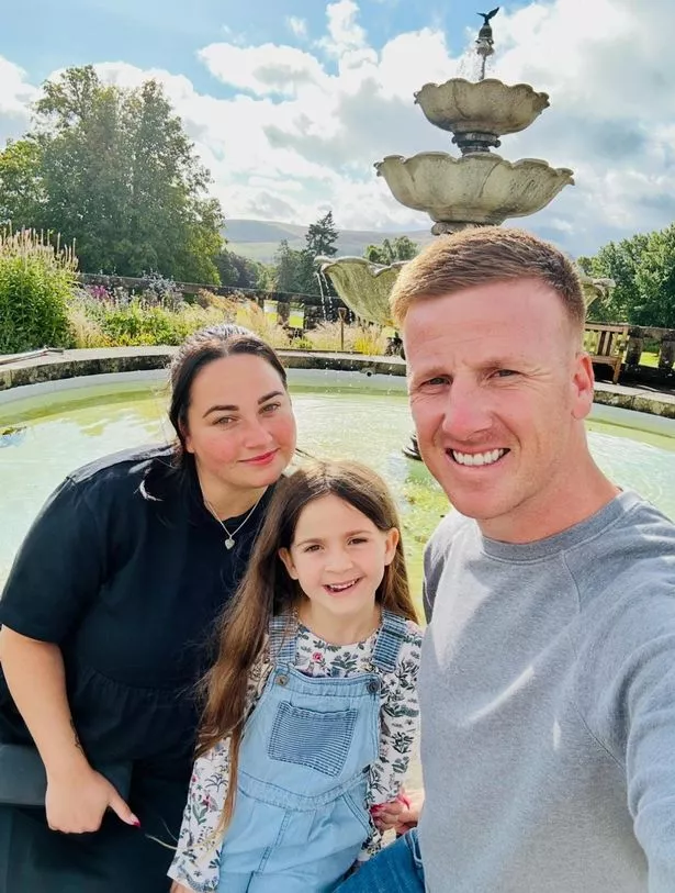 Joules with her mum Elisha and dad Joe Smith