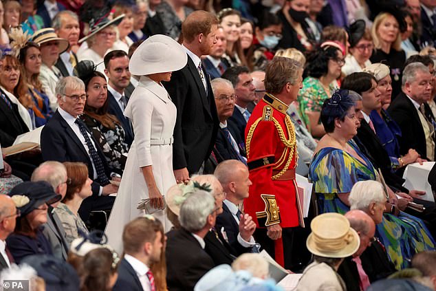 Crowds cheered the Sussexes as they arrived, with the couple smiling and waving - but both boos and cheers could be heard as they departed