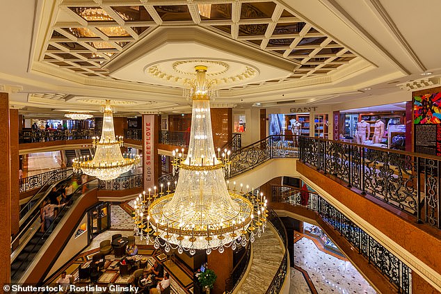 Pictured: Interior view of Metropole Shopping Center with 80 luxury shops and boutiques