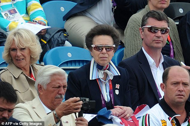 Princess Anne, Timothy Laurence and Camilla look on as Zara competes in the Jumping Phase of the Eventing competition of the 2012 London Olympics