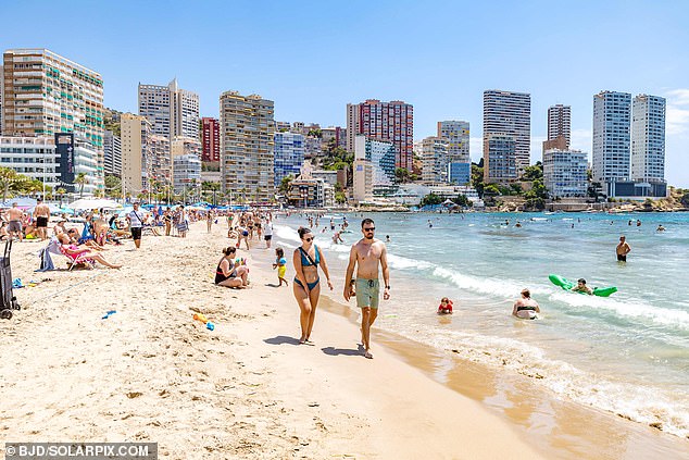 It follows mass protests across Spain where thousands have claimed excessive tourism is forcing locals out of affordable housing, raising the cost of living and making the city centres unusable. Pictured: A beach in Benidorm