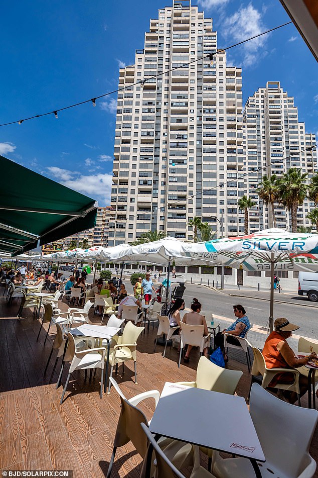 In Costa del Sol, the holiday rental sector saw a drop of 2.2% in tourist numbers during the first half of the year - a trend that has accelerated since March, when numbers hit a low of 57%. Pictured: A bar in Benidorm with empty tables