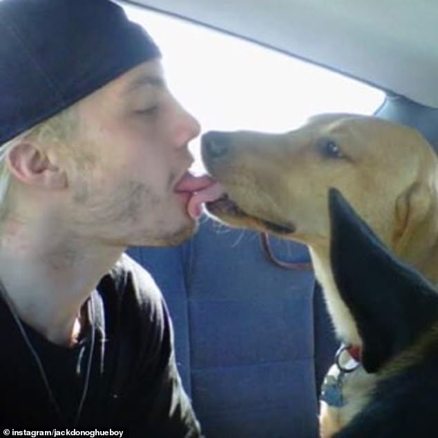 Donaghue had previously sparked controversy by sharing a photo of himself licking his pet dog's tongue (pictured)