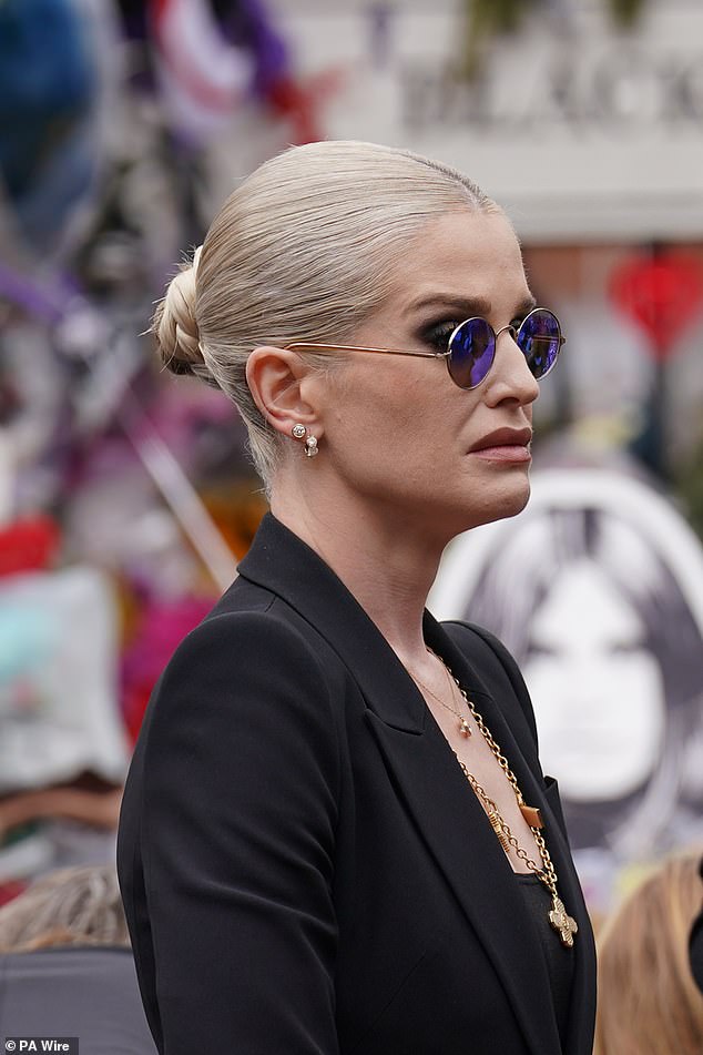 Kelly wore Ozzy's trademark purple glasses in a heartbreaking nod to her beloved father at his funeral procession on Wednesday