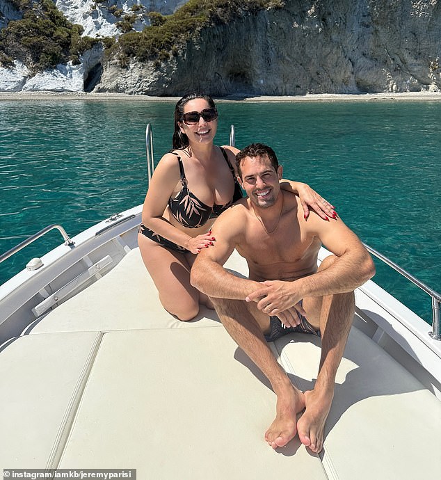 It comes after Kelly sent temperatures soaring in a black leaf-print bikini as she shared a slew of Instagram snaps from her romantic getaway with her husband Jeremy Parisi