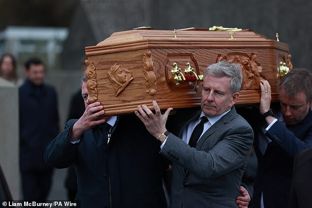 Patrick Kielty carries the coffin of his mother Mary Kielty, following her funeral at the Church of the Sacred Heart in Dundrum in March this year. Cat did not attend