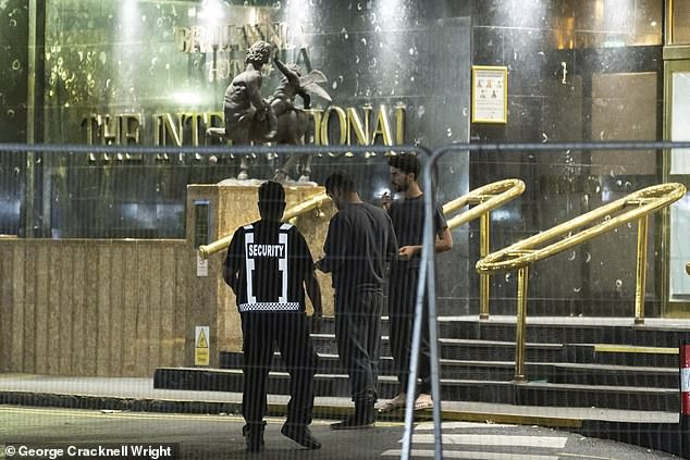 They were protected by security guards and metal barricades erected by the Metropolitan Police