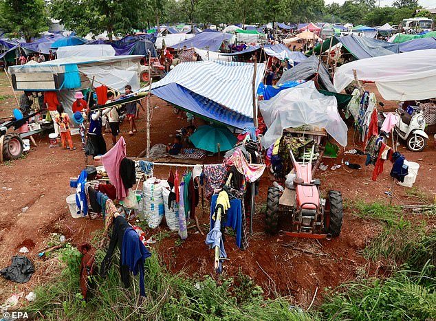 At least 43 people were killed in the intense clashes, which lasted five days and displaced more than 300,000 people on both sides of the border (Pictured: Displaced civilians along the Thai-Cambodian border gather at a makeshift shelter on July 26, 2025)
