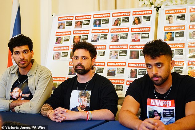 Ilay David, brother of Evyatar, Gal Gilboa Dalal, Nova survivor and brother of Guy Gilboa Dalal, and Amit Levy, brother of Naama Levy, speak at the Embassy of Israel in London