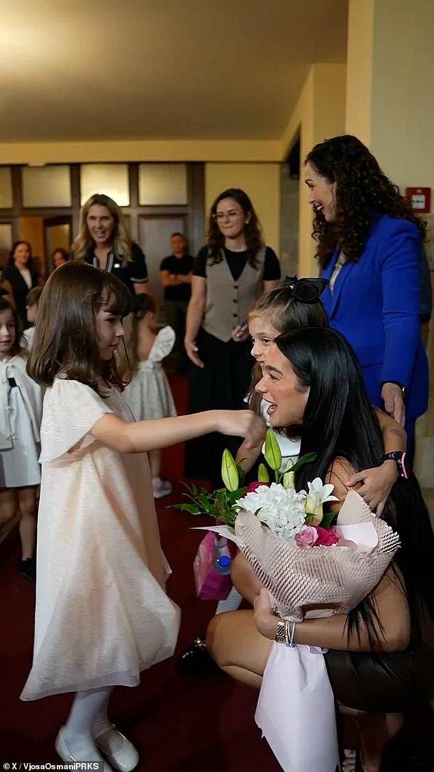 Dua was greeted by fans and a choir of children who sang her hit song Levitating
