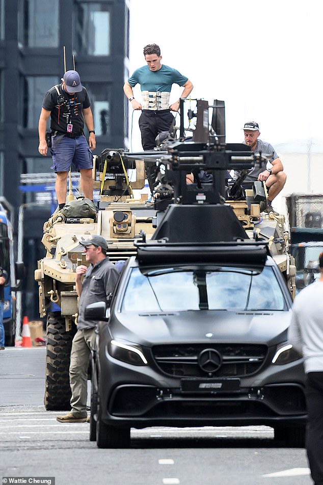 A stunt double for Tom Holland was spotted strapped to the roof of a moving vehicle as production for the film was well underway on Saturday