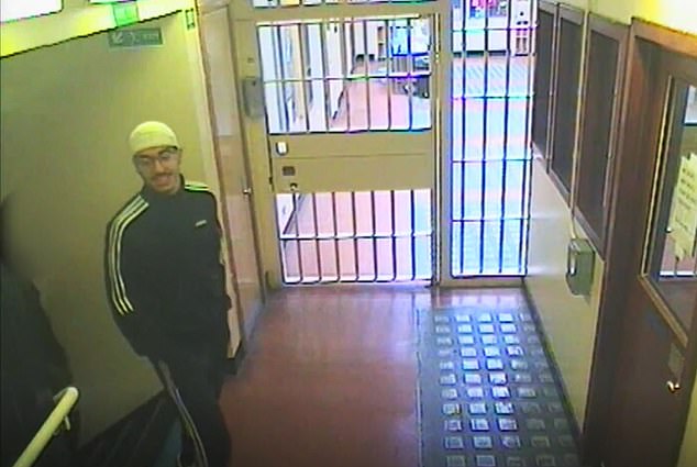 Abedi is seen with a smile on his face moments before the horrific alleged attack unfolded