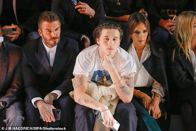 The couple have been at the centre of a feud with the Beckham family that has pitted Brooklyn, 26, and his wife Nicola, 30, against his parents and brothers [Brooklyn, David and Victoria in 2020]