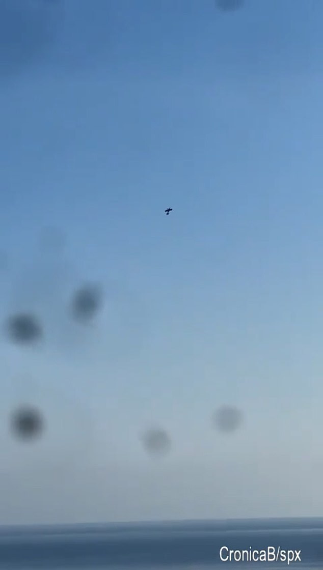 The plane was seen crashing into the sea near the tourist town of Soller just after 8pm on Saturday after being spotted doing air acrobatics including 'daring but legal' 360-Degree turns