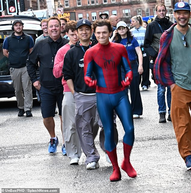Tom even appeared to jokingly shoot webs from his Spider-Man suit as he made his way to the set of the role that has made him a global superstar