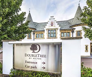 A shiny sign outside the establishment pictured advertising it to potential guests