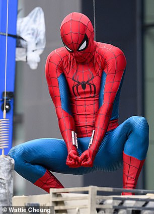 The actor appeared to be filming a scene where he was shooting webs as the famous character