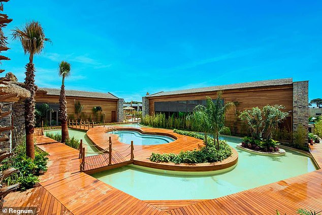 The grand hotel also features stunning gardens and swimming pools