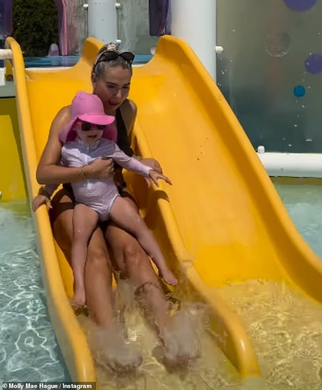Molly was seen beaming as Bambi, two, sat on her lap while going down a small water slide, at the Aqualantis which also includes a number of water slides and lazy rivers