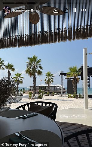 The couple enjoyed the sun at the restaurant overlooking the picturesque beach