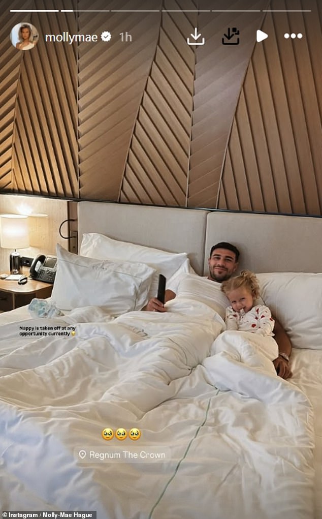 Molly shared a glimpse at the families huge luxurious room, which is one of 553 spacious suites and private villas at the hotel, as Tommy and Bambi cosied up in bed