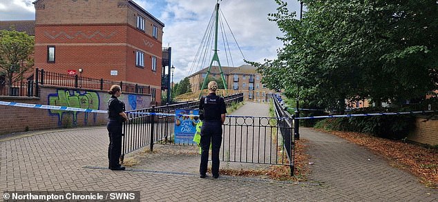 Police pictured at the scene on Sunday. A cordon remains in place around the area, with the footpath closed off and the river closed to boats as searches take place