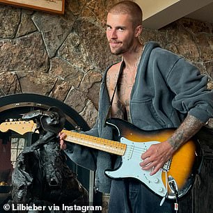 He flashed a small smile as he played the instrument and also gazed towards the camera in another image