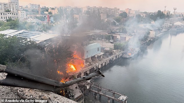 Fire breaks out after a Russian attack at the 3 private house and one apartment building as the emergency officials work at the area in Kherson, Ukraine on August 2, 2025