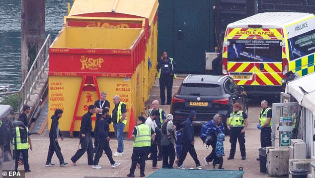 A group of people believed to be migrants is brought to Dover Marina from a UK Border Force vessel following small boat incidents in the English Channel in Dover, Kent, Britain, 17 July 2025
