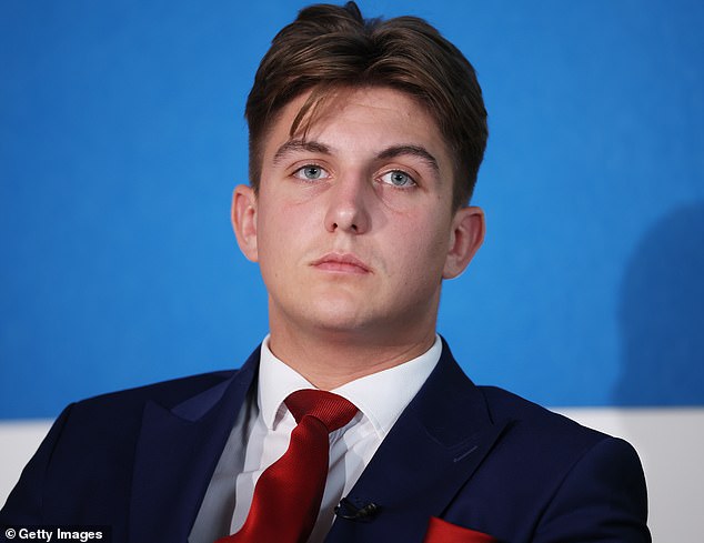 Appearing alongside Farage, George Finch (pictured), the 19-year-old Reform leader of Warwickshire County Council said he had ‘begged’ the police force to release details of the men’s backgrounds. but that police refused 'due to this phrase 