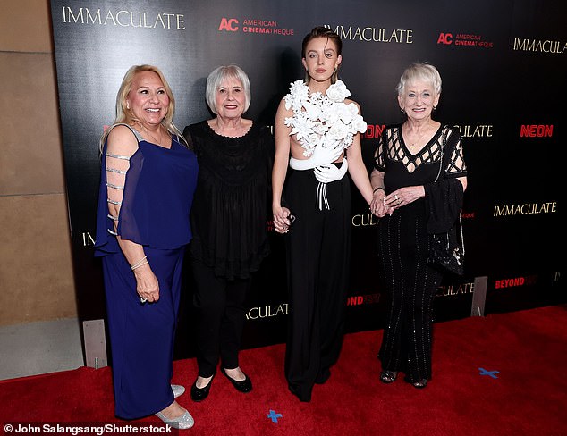 Sydney attended the premiere of Immaculate, a horror movie in which she plays a nun, alongside her grandmothers and dad in March, 2023