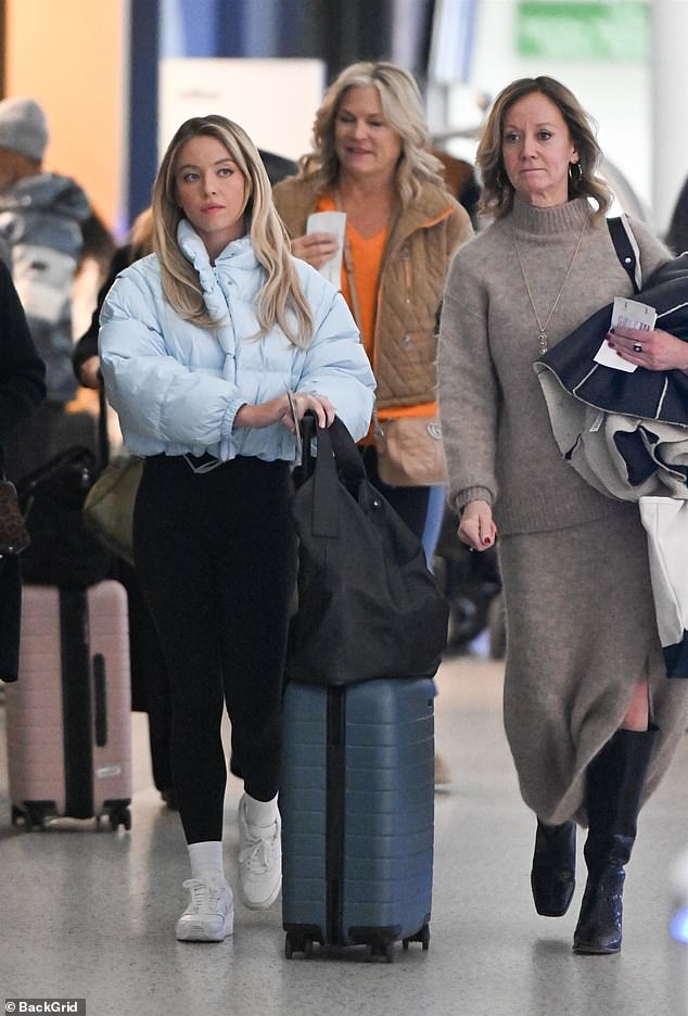 She told British GQ in 2022 that since achieving fame, her family 'doesn't understand' her or 'the world (she's) in anymore' (pictured with her mother, Lisa, in New York in 2023)