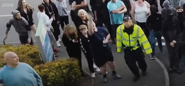 The mother-of-two, swears at the people in the hotel with her son next to her