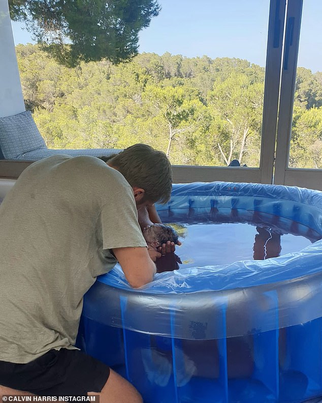 Calvin shared a picture of the tender moment he first met his son after the birth
