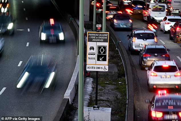 Drivers in Paris have been warned about the arrival of the carpooling lane since earlier this year with these signs on the 22-mile carriageway