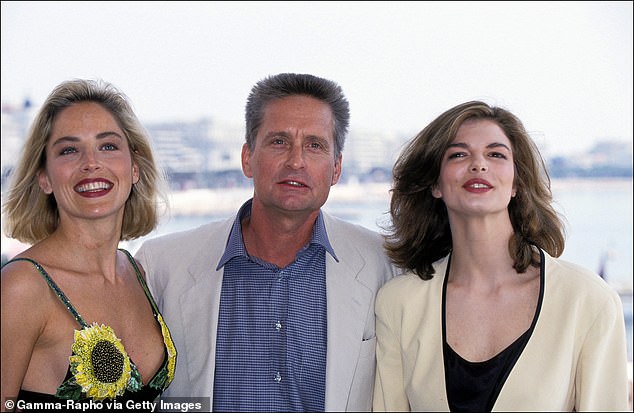 A rep for Michael denied they ever had an argument in the 'timeframe' Sharon alleged, but acknowledged they did all go Cannes to promote Basic Instinct; Stone seen at the film festival with Douglas and co-star Jeanne Tripplehorn in 1992