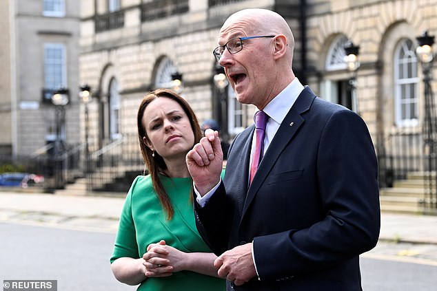 Deputy first minister Kate Forbes in pictured with Scotland's First Minister John Swinney (seen in May, 2024)