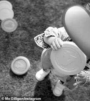 The brief black-and-white clip featured the boy, whose identity was concealed, gazing up at the camera while playing a game