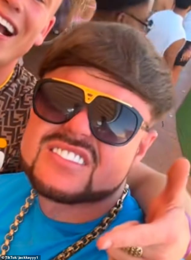 In the other video Mr Kay can be seen wearing the same iconic sunglasses and gold chain pulling out more dance moves from under his belt as a mate puts his arm around his neck