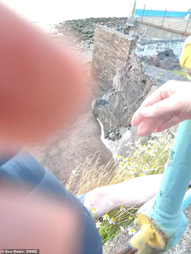The horror fall was captured on Laura's phone as it happened, luckily Ben was able to wrap his leg around the poll to stop himself from falling