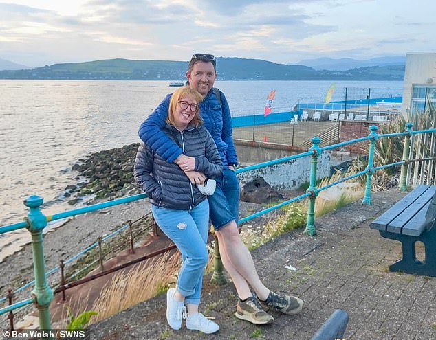 Ben Walsh, 40, from Retford in Nottinghamshire, and girlfriend Laura Taylor, 38, were strolling along the promenade in Gourock, Renfrew, when they stopped for a scenic snap