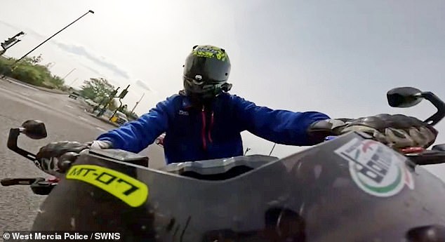 A brazen biker avoided death by inches before he was banned from driving by police who spotted his 100mph death-defying stunts online