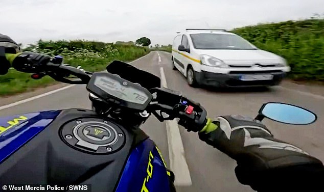 Further haunting clips see the driver slaloming between cars and facing oncoming traffic as he brazenly overtakes vehicles in his way