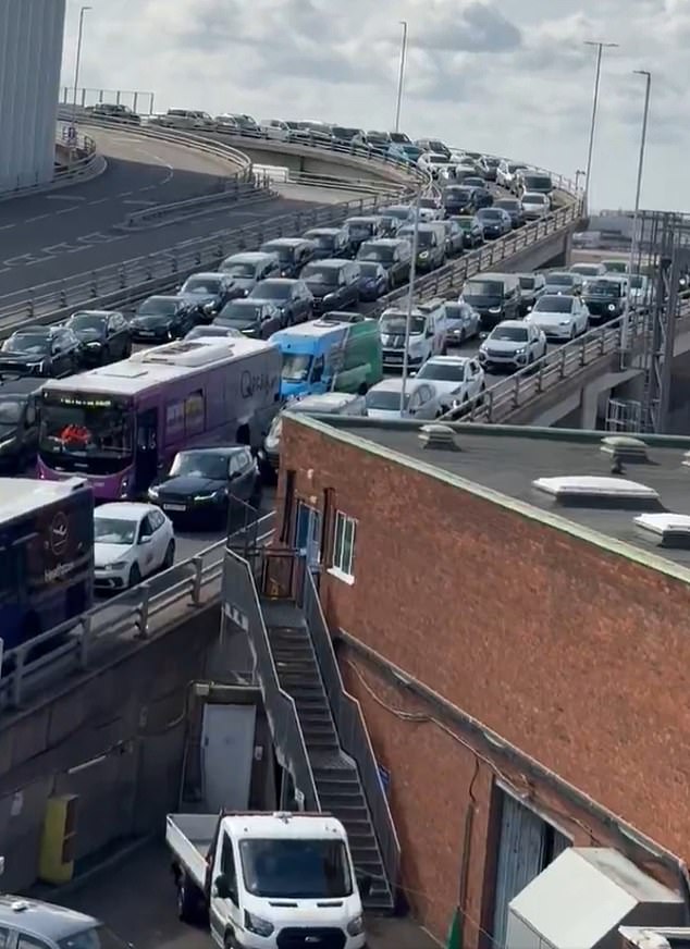 Dozens of vehicles can be seen gridlocked on roads leading up to the airport on Tuesday