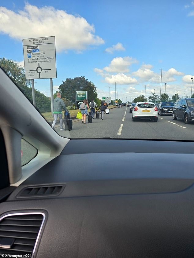 Desperate flyers have also been spotted sprinting down the motorway with their luggage in hand, eager to make sure they didn't miss their flights