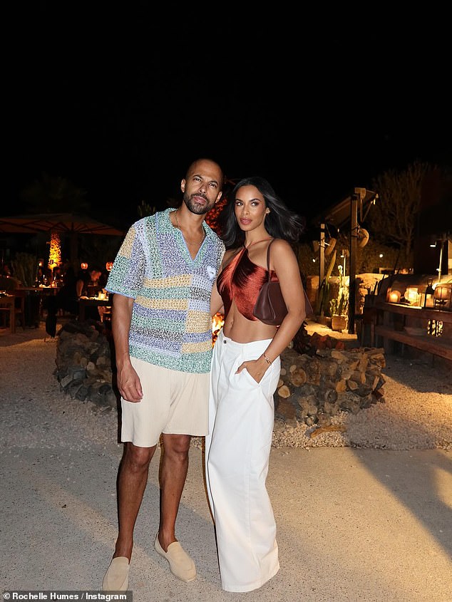In another snap, Rochelle flashed her abs in a red crop top, teamed with white trousers
